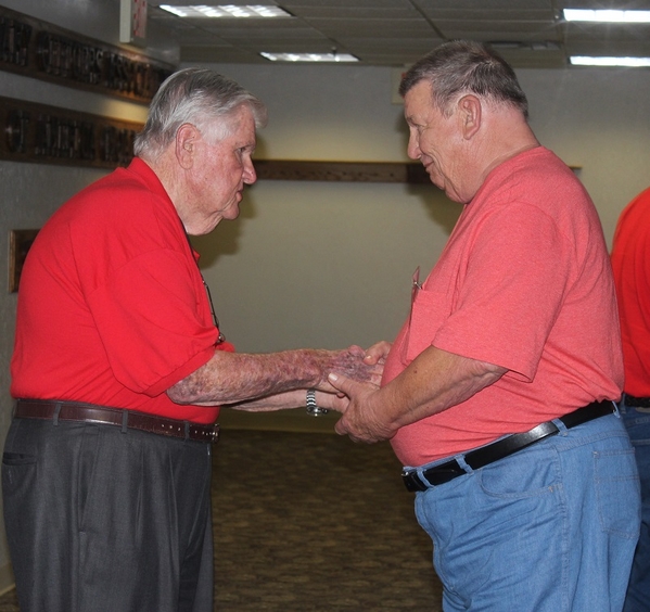 The Waldman Collection - Presenting Gifts
Host Jerry Orr presents "challenge coins" to Lt Frank Herbick.  Frank served as both a Forward Observer and as the Battalion S-1.  Frank says he got more flak serving as the S-! than any day served in the field.
