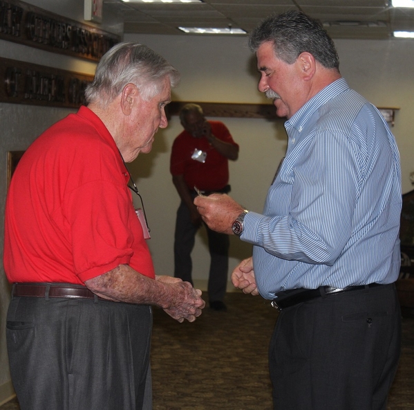 The Waldman Collection - Presenting Gifts
Host Jerry Orr presents "challenge coins" to Jim Connolly.  Jim served in the TOC.
