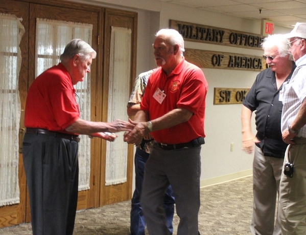 The Waldman Collection - Presenting Gifts
Host Jerry Orr presents a "challenge coin" to Cowboy Danny Fort, who lives in nearby Headrick, OK.  Danny spent a good bit of his tour in the FDC.
