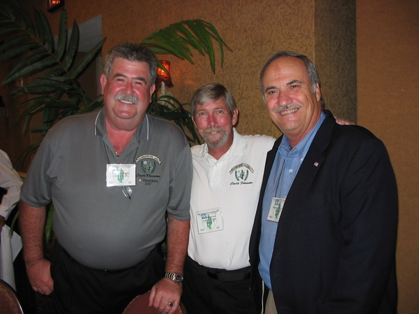 "We can smile now!"
Jim Connolly, Joe Henderson, and Mike Kurtgis renew old friendships.
