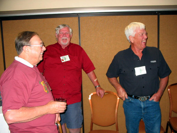 Cocktail Party
Dave Collins and Jim Cooke of C-1-35 coordinated with Bert Landau (left) for a special reception combining the grunts with the redlegs in Mandalay-4 room of the hotel.  Gary Dean Springer and Ed Thomas are center & right of the photo.
