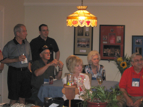 Watching the show
Dave Collins, his son-in-law, Dickie Dickerson, Ms Rosemary, Linda Dickerson, and Greg Malnar.
