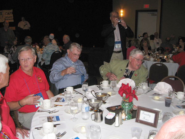 "Need some more water!"
Jerry Orr (r) seems to be ordering more water while Lt John Cashin ponders his empty glass.  Dennis Munden and Ed Thomas are at left.
