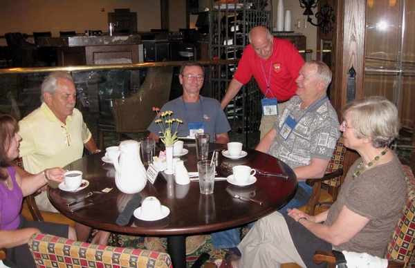 Breakfast at the Crowne Plaza
FO Lt Don Keith makes the rounds, talking to Pete Birrow and Terry Savely.

