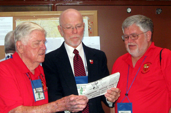 Old News
Jerry Orr, John Mullins, and Steve Sykora look at a publication from the days in Nam.
