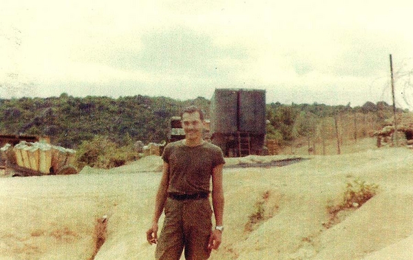 Here I am
Bill Kull, "B" Battery, 2/9th Arty.  Familiar sights on a firebase.
