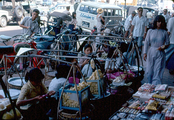 Streets of Saigon
A visual confirmation of the hustle and bustle of downtown Saigon, November, 1966.  Despite "modern times", street merchants still persist.
