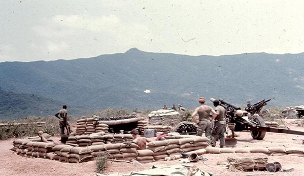 Origins of LZ OD
LZ Olive Drab is under construction.  Became home to the 1/35th Inf Bn HQ and "A" Battery, 2/9th.  Here is a rare opportunity to fire Charge 1 and see a smoke round land.

Location: We are looking due north.  Turning around, we would see LZ Montezuma, later re-named LZ Bronco, and the South China See.  We came here to relieve the Marines who were sent further north.  Our other two batteries were located nearby at LZ Liz and LZ Mary Lou.  We eventually departed LZ OD for Tam Ky in early October.
