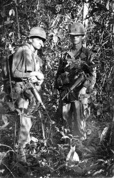 Returning to Dragon Crater
On left: my RTO, Cpl Robert McGlynn; I am on the right.  We were on our way back to Dragon Crater, 21Nov66.
