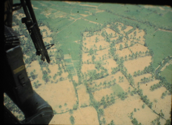 View from the chopper
No collection of Vietnam photos is complete without a shot of the M-60 doorgunner's bird's eye view flying over a rice paddy.
