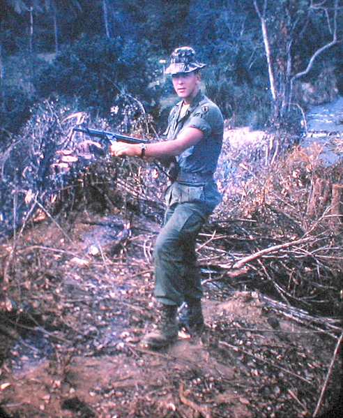 Ed's Arsenal
Lt Ed Thomas holding a sten gun.
