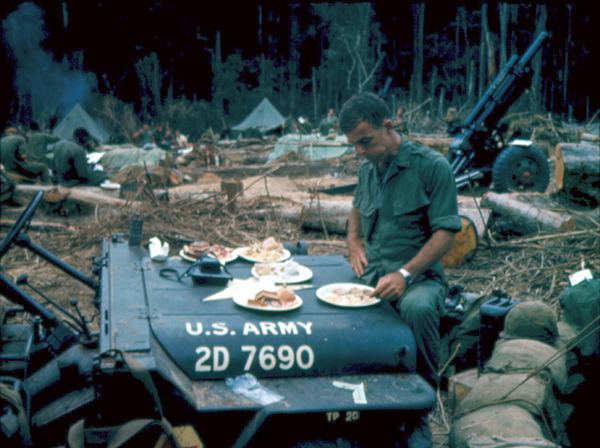 LZ 510B
Capt Higgins enjoys his Thanksgiving meal on the hood of the jeep.

