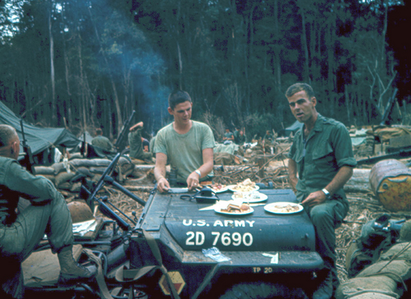 LZ 510B
Lt Gary Dean Springer and Capt Higgins "share the table" for a good Thanksgiving day meal.

