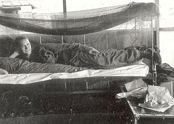 Brigade luxury
Lt Kermit DeVaughn enjoys the comfort of a real bed at the 3rd Brigade base.  December, 1966.
