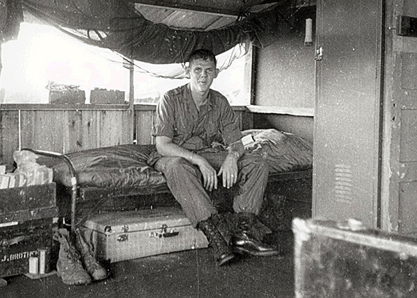 "Damn, this is a real bed!"
FOs don't get the luxury of beds very often.
Lt Springer kicking back at the 3rd Brigade base, December, 1966.
