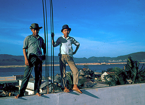 Qui Nhon
Two boys atop the roof of a hotel in Qui Nhon.
