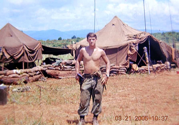 Hi, Mom!  I'm in Vietnam
Hadn't learned to use the .45 cal on my hip when this photo was taken, but it sure kept anyone from stealing the monopoly money that we called "payroll".  Note the R-292 antennas and the M2 Aiming Circle in the background.
