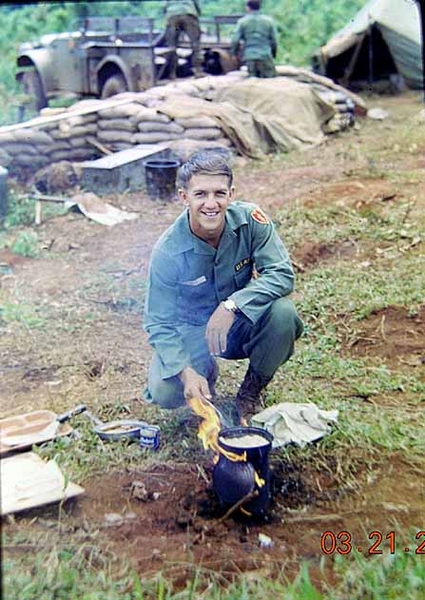 GI Cook
We got some eggs somehow and so here I am, cooking them up.  Note the "stateside uniform": fatigues with the white cloth nametags, the black & gold "US Army" tag, and the 25th Inf Div patch on the LEFT shoulder, which would eventually wind up on the RIGHT shoulder.

