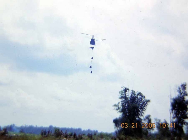 Triple-Dipple
Here is a CH-47 lifting a water buffalo and three (not two) brass casing Packs.  We had a miscommunication -- and the pilot thought he had two casing Packs. So he dragged the bottom pack through our Battery and we lucky no damage to us or to him. 

