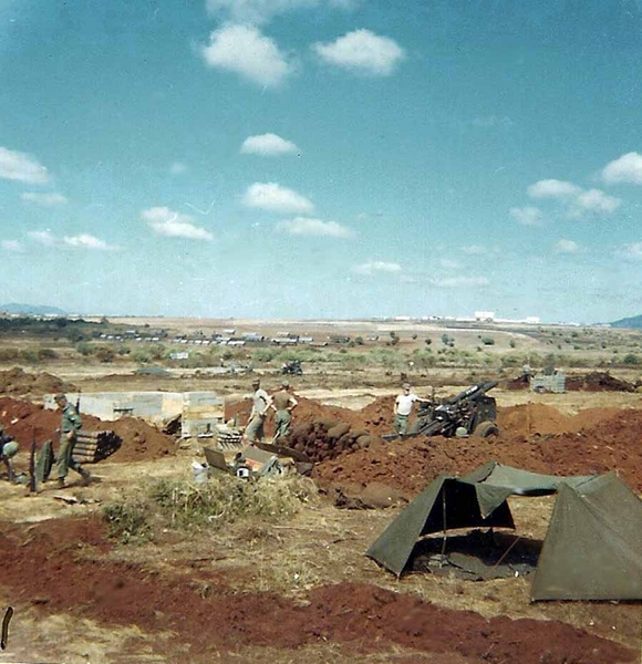 "Base Camp" - Jan 1966
Picture of 2nd gun section digging in.  Tent in foreground is where PFC Richard A. Williams and I spent 1st night in Vietnam, 12Jan66.
