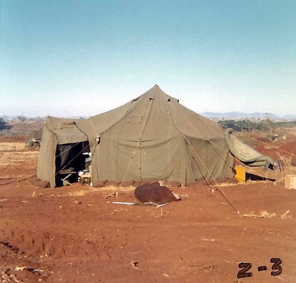 From the "Pink Kitty" to Tent City for the FDC
We bailed out of the "Pink Kitty" FDC.  Obviously, it was not sustainable in our new jungle environment.  This GP-small tent also served as the FDC sleeping quarters. 
