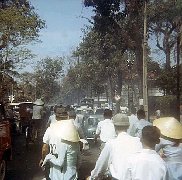 Traffic Jam
The local street toughs that the GI's referred to as "cowboys" used to give me a motorcycle to ride around on. HERE is what is looked like out on the streets in the embassy district near the U.S. Special Services compound in the late afternoons. Traffic jam, South Vietnamese style!

