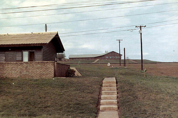 Living Quarters at Pleiku AFB
The "Cider FACs" house with the Officers Club up the hill.  Great steaks with "hot & cold running" in the hooches and clean sheets on the beds.
