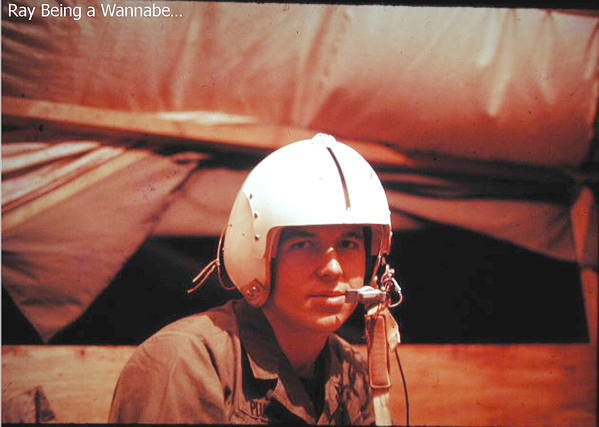 "The Wannabe"
My RTO Ray Plunkett posing as a "wannabe" pilot.
If those AF pilots rented out their helmets for photos, they could retire without need of a pension.
