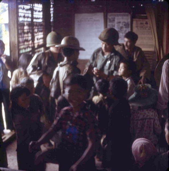"MedCap"
Providing medical assistance to Vietnamese civilians.  Here the kids mingle with the Medics.

