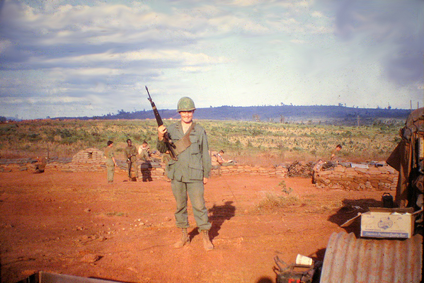 Unknown Lieutenant
A smiling Lieutenant hoisting his M16.  Anybody know this guy?
