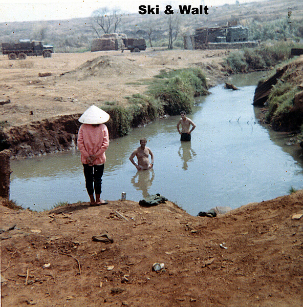 The mud puddle/stream
Walt & PFC Michael Pskowski ("Ski") stand in the middle of a stream.  Certain not to be up to EPA standards.
