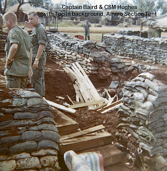 Aftermath
Capt Robert D. Baird, CSM Hughes survey damage to the Ammo Section tentage.  Top Davis is in the background.
