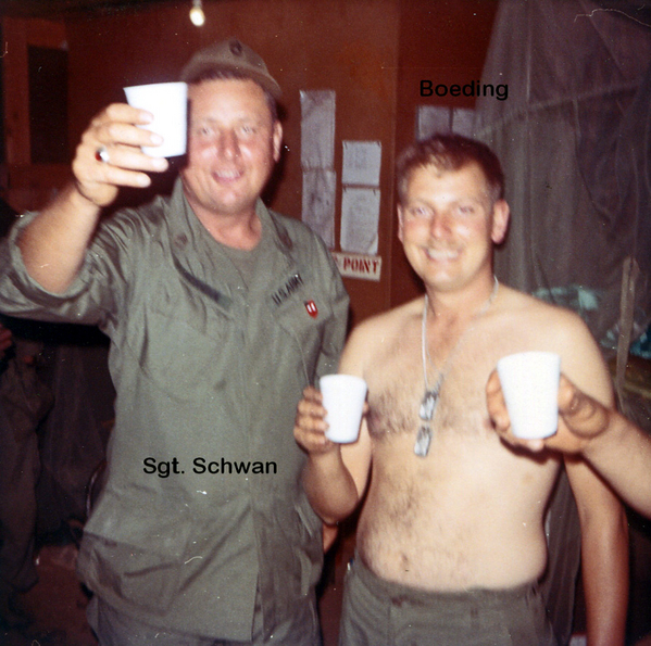 Party Time
"Here's to ya!"  SSgt Schwan and Robert Boeding of the Survey Section.  Perhaps they are saying, "Let's have another 'round'?"
