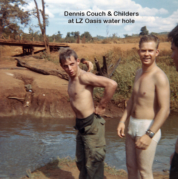 Sears Underwear Ad
Sp4 Dennis Couch and friend Sp4 Al Childers next to LZ Oasis water hole.
