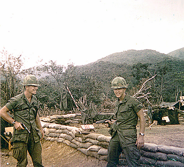 Yep, we were crazy!
FO Lt Bill Farmer and FO Lt Ed Thomas engage in a game of fast draw.  Looks like Ed got the drop on Bill, but neither man has their finger on the trigger mechanism.  Lt Bill Farmer was later KIA as he volunteered to fill in for a absent FO.
