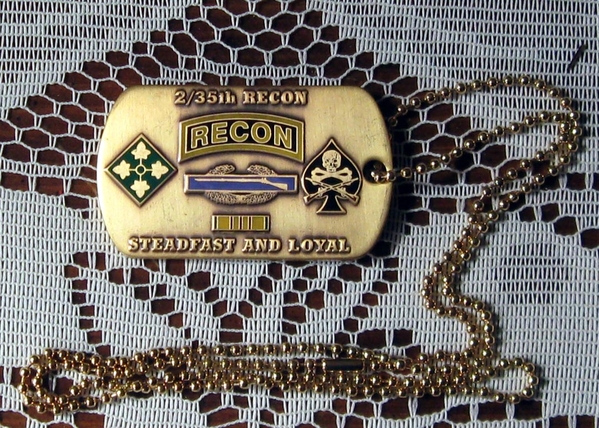 Gift from Jackie Tyler
After the presentation of the 2/9th Challenge Coins to the 35th Assn Presidents, "E" Recon member Jackie Tyler presented me with a beautiful "Recon" dogtag in gold finish.  I shall treasure it always and it is displayed on my computer desk.  Thank you, Jackie, for this wonderful memento!
