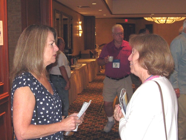 Who sez?
Who says you can't meet beautiful women at the 35th Reunion?  Chris Dunn, spouse of David Dunn chats with Connie Sadler, spouse of John Sadler.
