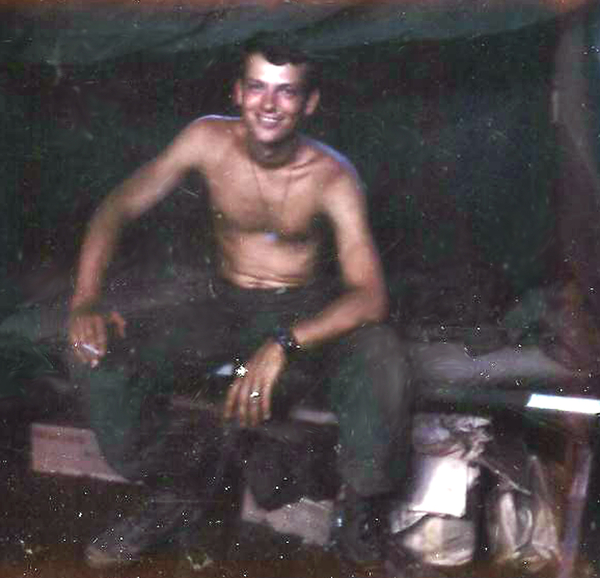 Cot in FDC Bunker
Sitting on a cot in the FDC bunker at LZ St. George.  Wasn't my sack.  I was the newbie who got the stretcher held up by ammo boxes.  My bed was unfortunately used for its intended purpose in November and that was the last use of it or my poncho liner.

