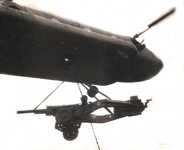 Thar She Goes!
One of our M-102 howitzers hooked up and lifting off for a hip shoot at LZ Cathy, September, 1969.

