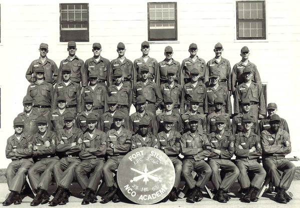 Here's where it all began
(2nd from right 1st row) While attending the NCO Academy at Ft Sill, I remember taking my turn to march the class.  I marched them into the flower bed of the Officer's Training Barracks. I commanded 'Platoon,halt' and then 'about, face' and 'forward, march'. As I looked back I saw about 40 spots of (turning marks) marks in the flower bed gravel. So I then commanded 'double time,march'. A day or two later I was sent to California and then to Hawaii (on a PAN AM flight) and hooked up with the 2/9th.
