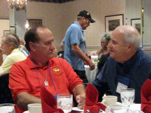 Joint Dinner - C-1-35 & 2/9th
"Ya don't say?"  Mike Kurtgis, left, listens to a war story from Wayne Crochet at the joint unit dinner.
