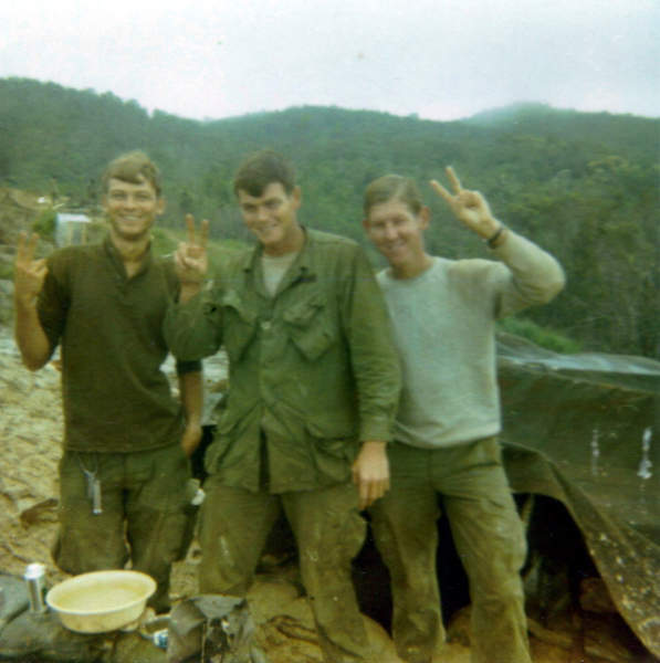 LZ Tuffy - 1970
Mike Medley, "Carl the FNG" (but great guy who saved my butt on the Advance Party going into the cluster at Susie Pig), and Eugene "George" Jarisch getting cleaned up in front of our hooch.
 
