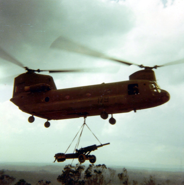 LZ Tuffy - 1970
A CH-47 Chinook (Shithook) arrives to bring in a M102 howitzer.
