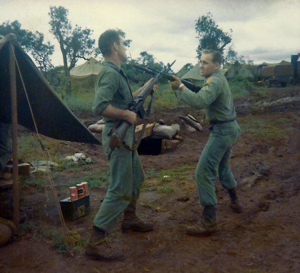 When there's no enemy around to fight...
Staying in shape by practicing bayonet drills.  Redlegs Dino Martin and Pfc Gordon G. Roufs.
