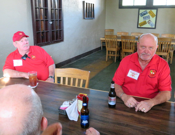 Old Plantation - Thurs Evening Dinner
John Waldman, left, looks at Charles Sizemore.  Charles looks like he got a warm beer instead of a cold one.

Photo courtesy of Barbara Moeller.
