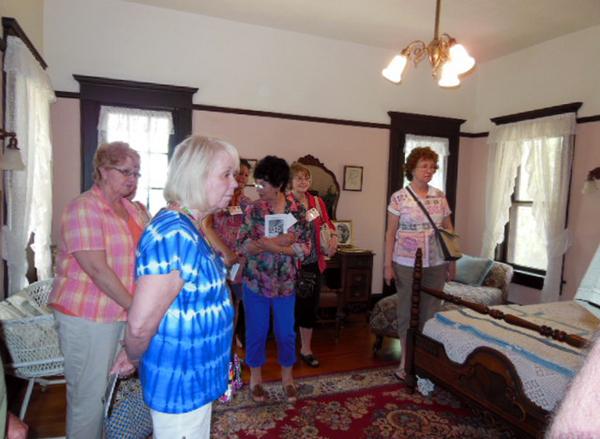 Reunion Photos - Jerry Orr
Lives of the Lawton rich and famous at the Mattie Beal House.  Our ladies go on tour. Martha Henderson gets a good look at the interior design.
