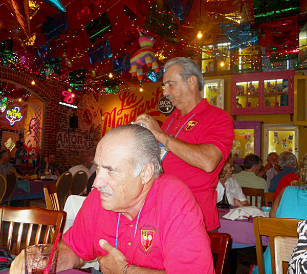 Friday Night Special at LaMargarita
Colorful background as Dennis Dauphin adjusts his camera.  Mike Kurtgis deep in thought.
