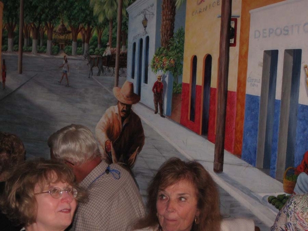 Party Time!  C-1-35 & 2/9th Arty at the LaMargarita
Jackie Dauphin (Lt Dennis Dauphin) and Lorraine Knight (Lt Mike Kurtgis) seemed to be in the street with the approaching bandido in a colorful wall mural at the La Margarita restaurant in the Mexican Market.
