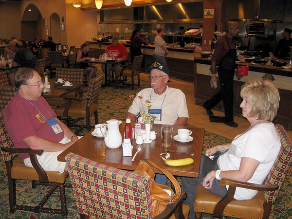 Breakfast at the Crowne Plaza
"Who ordered the banana?" seems to be the question.  Lt Bert Landau, FO, 2/9th, seated at left.
