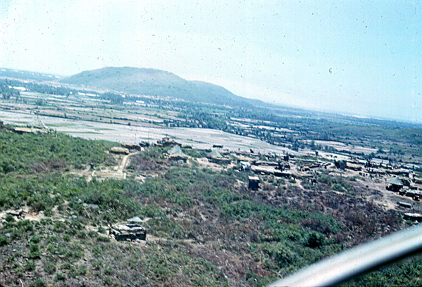 Catch-all shot
This photo captures the entire firebase known as LZ Olive Drab (OD) along with the protective hill in the background that flanked LZ Montezuma/FSB Bronco.  Over that hill is the South China Sea.
